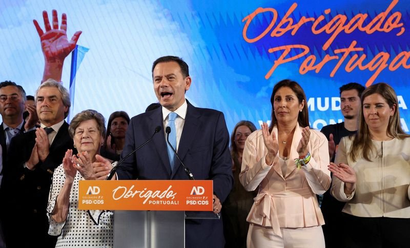 Portugal's ruling centre-right alliance wins election, but far-right makes record gains