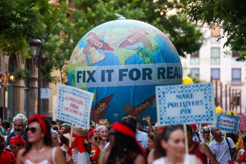 Protesters demand debt cancellation, climate action ahead of UN summit