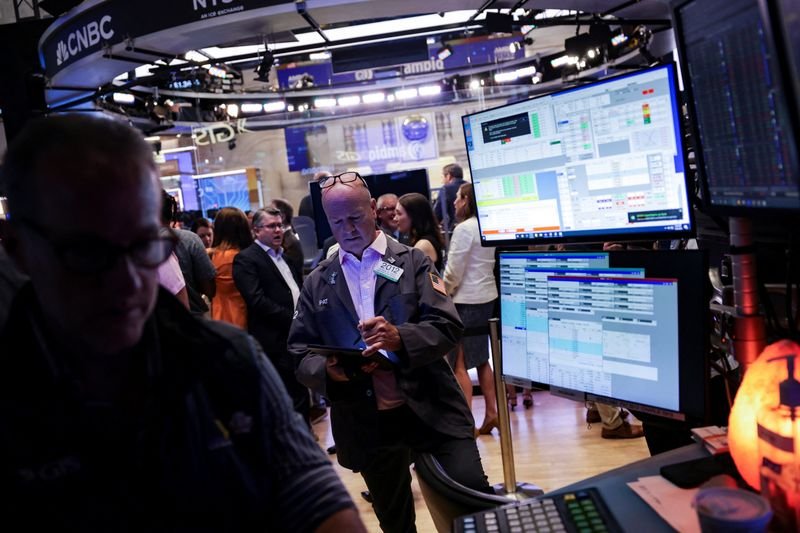 Wall Street ends higher with Nasdaq up more than 1%, led by Apple